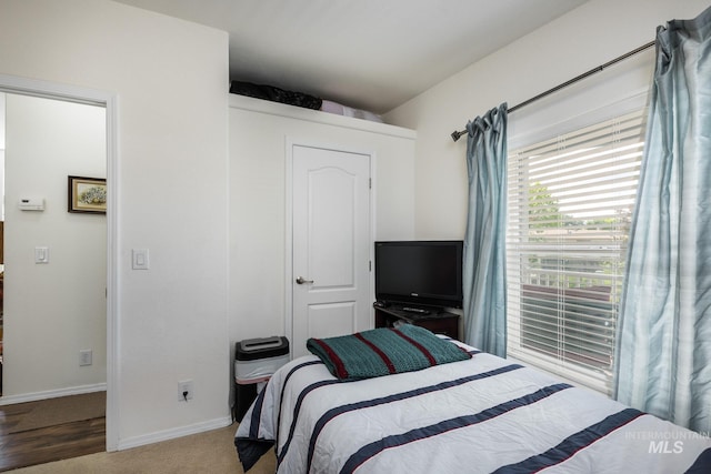 421 Curtis Rd Unit 120, Boise, ID 83705 - bedroom with baseboards and carpet
