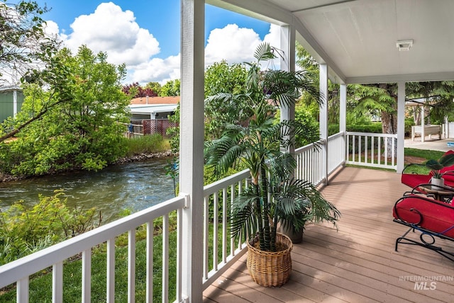 421 Curtis Rd Unit 120, Boise, ID 83705 - wooden terrace featuring a water view
