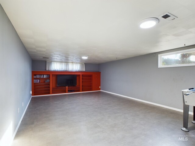 basement with tile patterned flooring