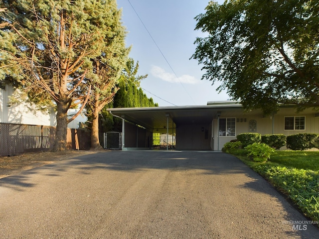 view of front of house with a carport