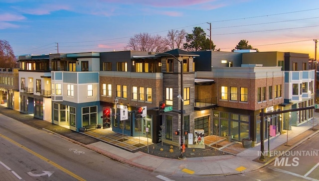 view of property at dusk