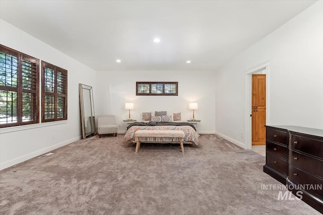 1512 E Rivers End Ct, Eagle, ID 83616 - bedroom with multiple windows, light colored carpet, and recessed lighting