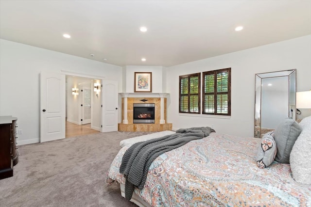 1512 E Rivers End Ct, Eagle, ID 83616 - bedroom with light carpet, recessed lighting, and a fireplace