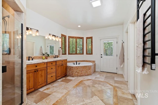1512 E Rivers End Ct, Eagle, ID 83616 - full bathroom featuring double vanity, a bath, a stall shower, recessed lighting, and inlaid floor details