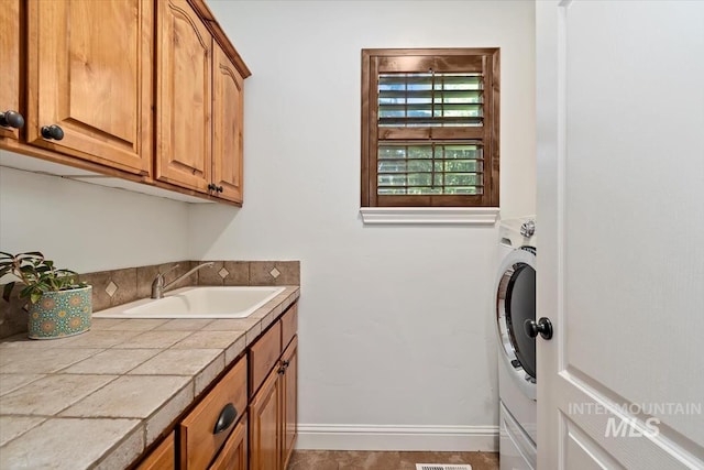 1512 E Rivers End Ct, Eagle, ID 83616 - washroom featuring cabinet space and baseboards