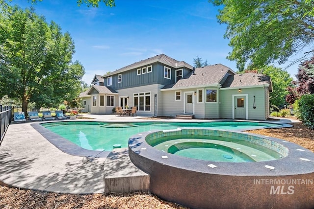 1512 E Rivers End Ct, Eagle, ID 83616 - view of pool featuring a patio area, a pool with connected hot tub, and entry steps