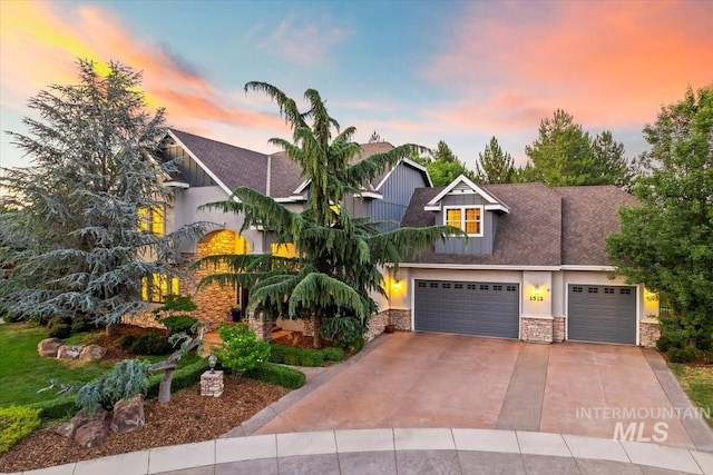 1512 E Rivers End Ct, Eagle, ID 83616 - craftsman house with stone siding, driveway, and a garage