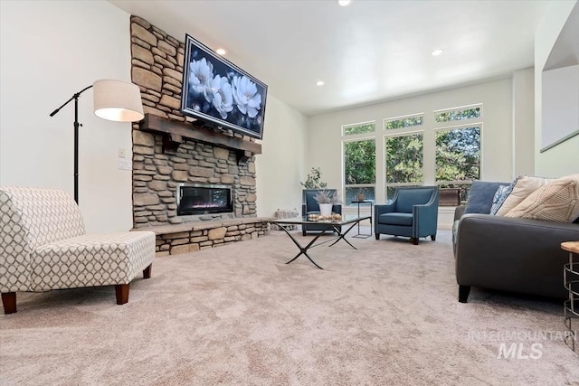 1512 E Rivers End Ct, Eagle, ID 83616 - carpeted living area featuring a fireplace and recessed lighting