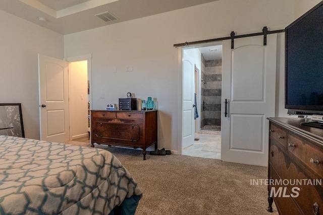 150 Cayuse Creek Dr, Kimberly, ID 83341 - bedroom with light carpet and a barn door