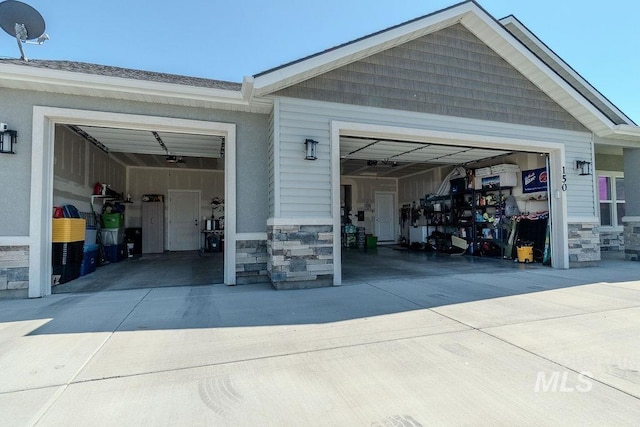 150 Cayuse Creek Dr, Kimberly, ID 83341 - garage featuring concrete driveway