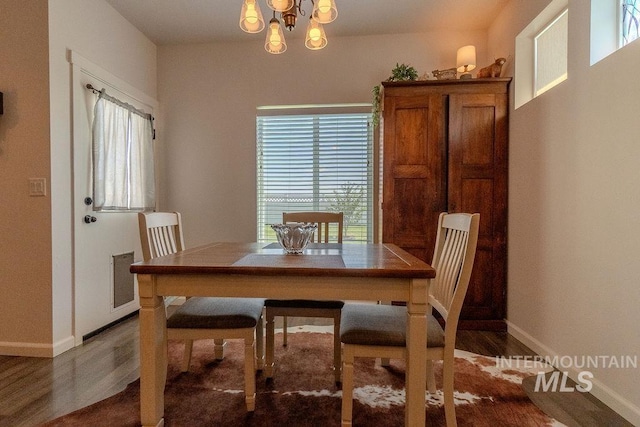 150 Cayuse Creek Dr, Kimberly, ID 83341 - dining room with wood finished floors and a chandelier