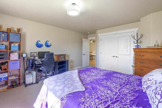 bedroom featuring a closet and carpet