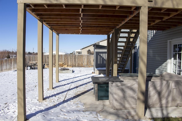 view of snow covered patio