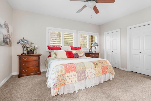 9 Autumn Blaze Ln, Salmon, ID 83467 - carpeted bedroom featuring two closets, baseboards, and a ceiling fan