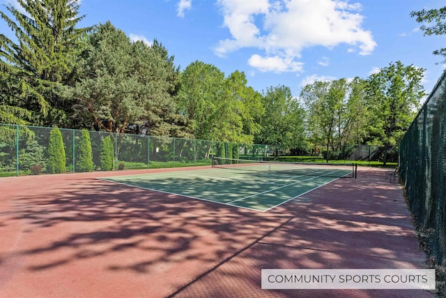 view of tennis court featuring community basketball court