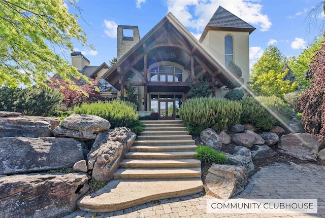 view of property featuring stairway