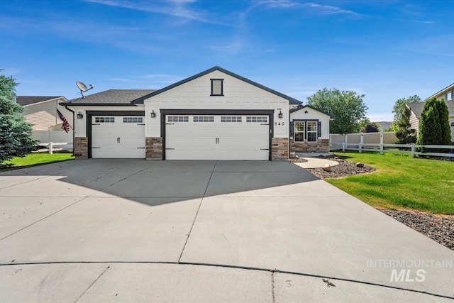 940 S Prospect Peak Way, Emmett, ID 83617 - ranch-style house with driveway, an attached garage, and stone siding