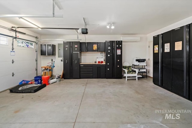 940 S Prospect Peak Way, Emmett, ID 83617 - garage with a wall mounted air conditioner and a garage door opener