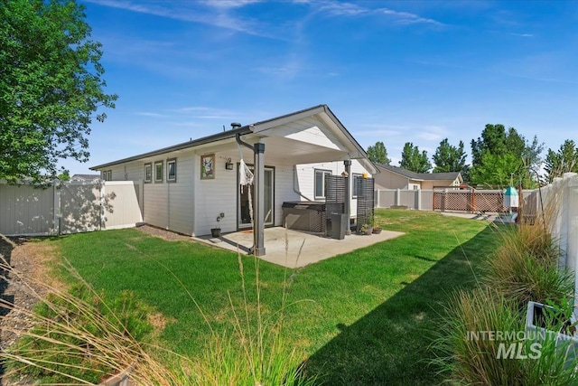 940 S Prospect Peak Way, Emmett, ID 83617 - rear view of house featuring a patio