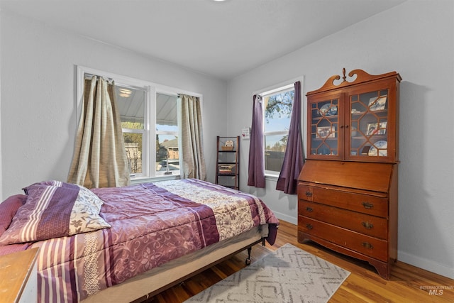 bedroom featuring light wood-type flooring