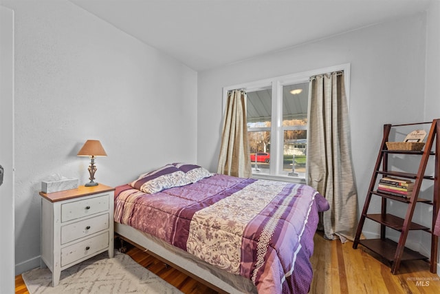 bedroom featuring light hardwood / wood-style flooring