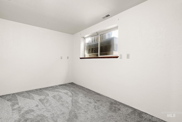 empty room with carpet floors