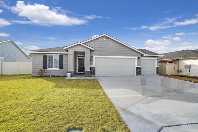 view of front facade featuring a front lawn and a garage