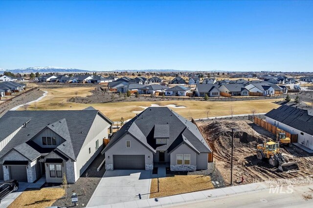 view of front of house with a front lawn and a garage