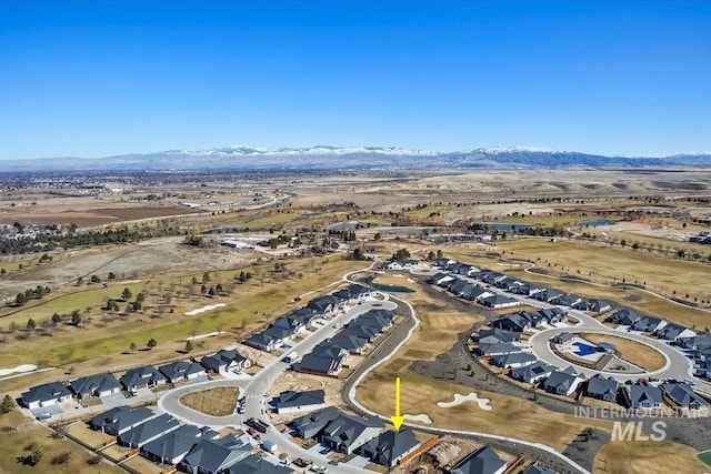 bird's eye view featuring a residential view and a mountain view