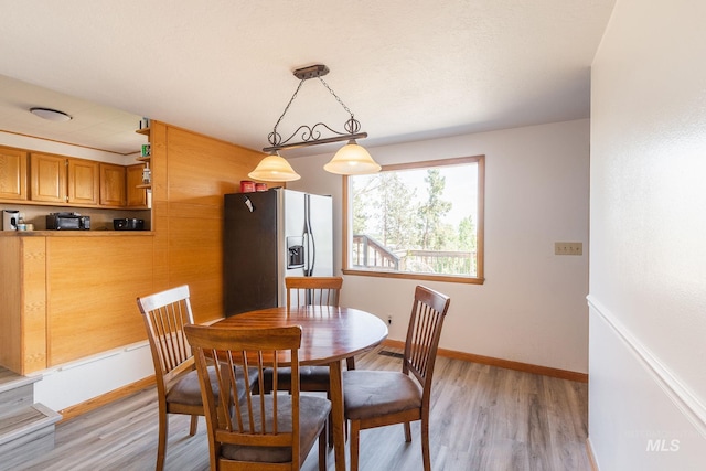 dining area featuring light hardwood / wood-style flooring