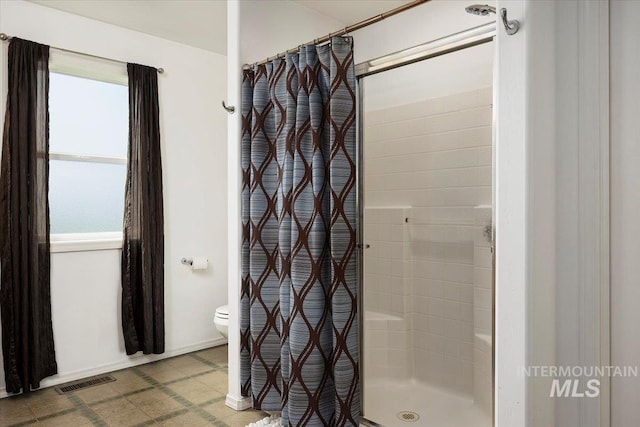 323 W 100 N, Jerome, ID 83338 - full bath with a shower stall, visible vents, and toilet