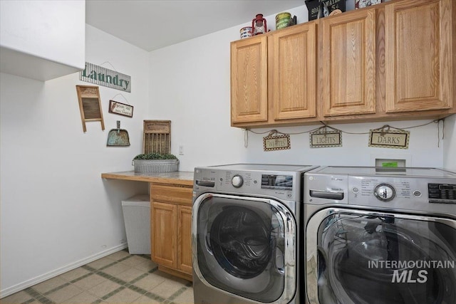 323 W 100 N, Jerome, ID 83338 - washroom with cabinet space, washing machine and clothes dryer, light floors, and baseboards