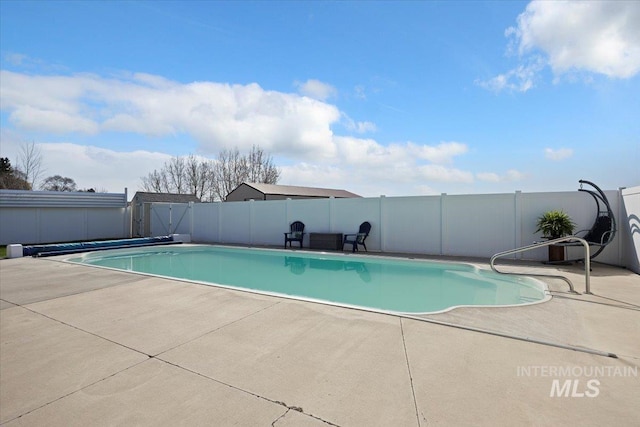 323 W 100 N, Jerome, ID 83338 - view of swimming pool featuring a fenced in pool, a patio area, and fence