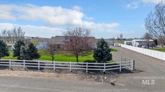 323 W 100 N, Jerome, ID 83338 - view of front facade featuring a residential view and fence