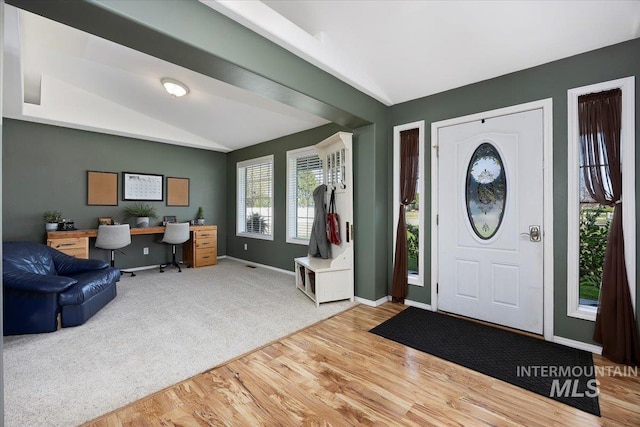 323 W 100 N, Jerome, ID 83338 - entryway featuring baseboards, vaulted ceiling, and wood finished floors