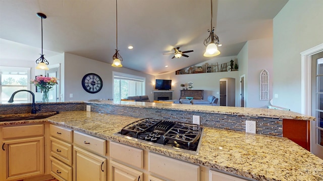 3634 E 3892 N, Kimberly, ID 83341 - kitchen with black gas stovetop, a sink, ceiling fan, vaulted ceiling, and a fireplace