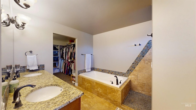3634 E 3892 N, Kimberly, ID 83341 - full bathroom with a garden tub, a walk in closet, and double vanity
