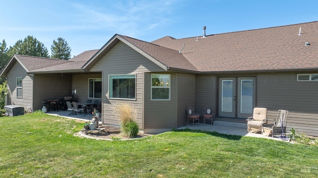 3634 E 3892 N, Kimberly, ID 83341 - back of property with french doors, a patio area, and a yard