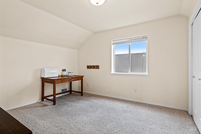 bonus room featuring lofted ceiling and carpet floors