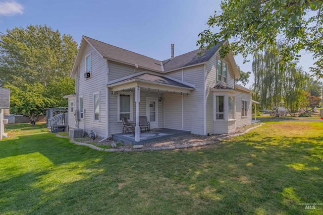 1035 Francis St, Clarkston, WA 99403 - view of front facade with a front yard, a patio, and a shingled roof