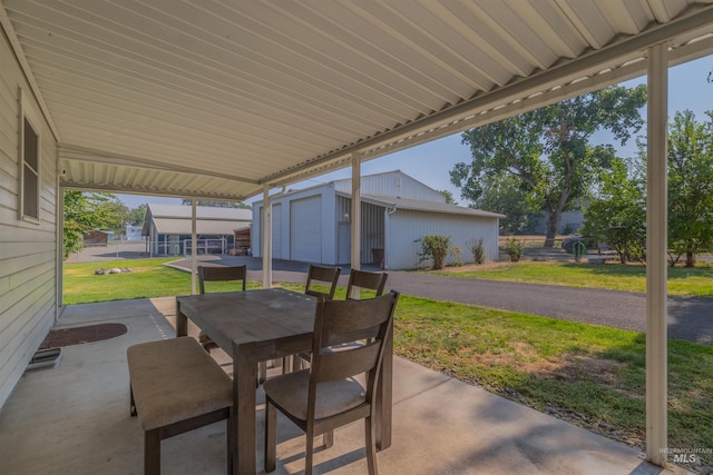1035 Francis St, Clarkston, WA 99403 - view of patio / terrace with an outdoor structure and outdoor dining area