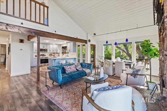 1909 E Roanoke Dr, Boise, ID 83712 - living room with high vaulted ceiling, wood finished floors, and baseboards