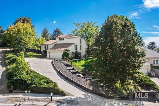 1909 E Roanoke Dr, Boise, ID 83712 - view of front of property featuring driveway and a garage