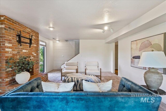 1909 E Roanoke Dr, Boise, ID 83712 - living area with carpet floors and a textured ceiling