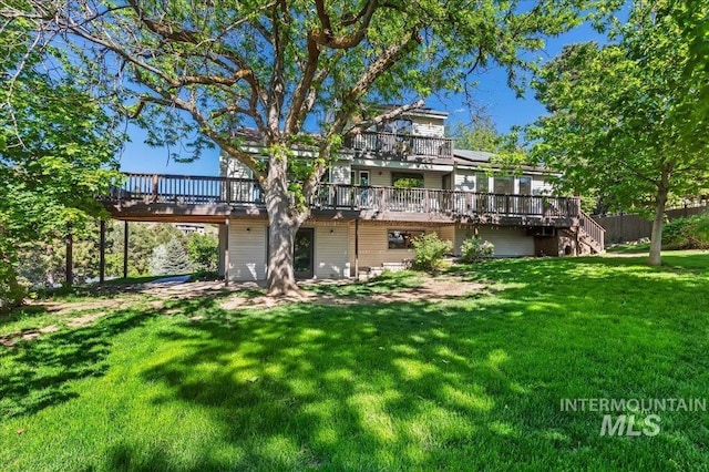 1909 E Roanoke Dr, Boise, ID 83712 - rear view of property featuring a wooden deck, stairs, and a lawn