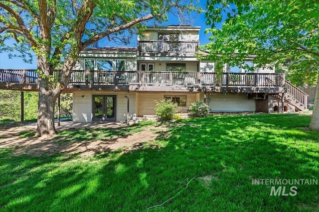1909 E Roanoke Dr, Boise, ID 83712 - back of house featuring french doors, a deck, a lawn, and stairway