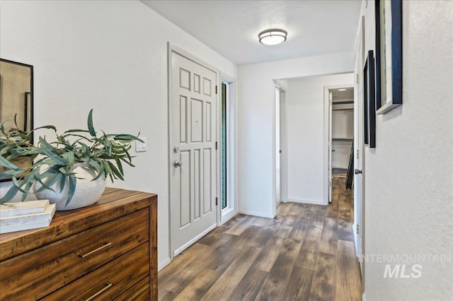 1909 E Roanoke Dr, Boise, ID 83712 - hallway with wood finished floors and baseboards