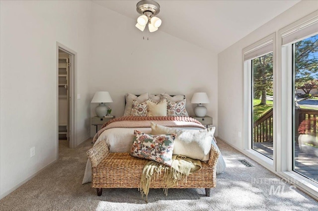 1909 E Roanoke Dr, Boise, ID 83712 - carpeted bedroom featuring vaulted ceiling, access to outside, and a spacious closet