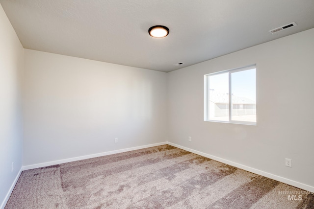 empty room with carpet floors