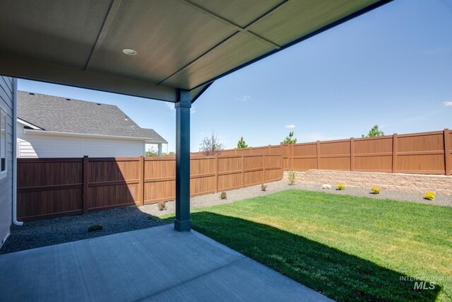 6847 W Riverwood St, Boise, ID 83709 - view of yard featuring a patio and a fenced backyard
